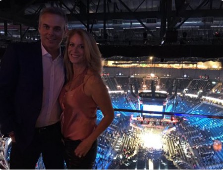 Colin Cowherd and Ann Cowherd at a fight match